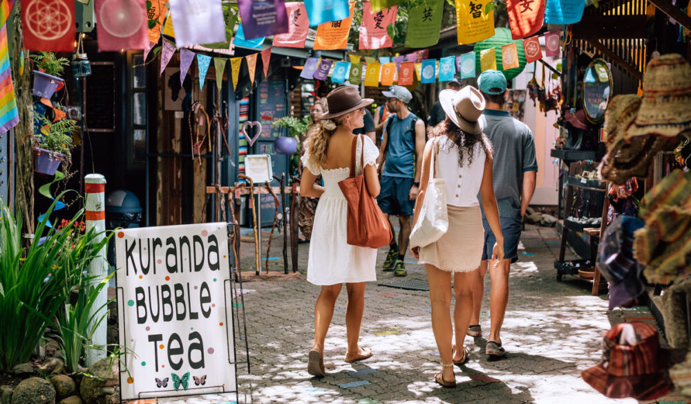 two women strolling along Kuranda Original Rainforest Markets
