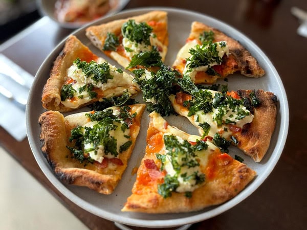 pizza slices on a plate at Elementi, Brisbane