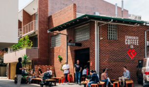 people sitting on al fresco chairs outside Community Coffee Co, Perth