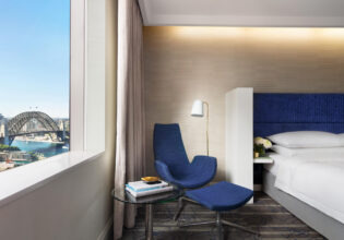 a suite with a bridge view at Sydney Harbour Marriott Hotel Circular Quay