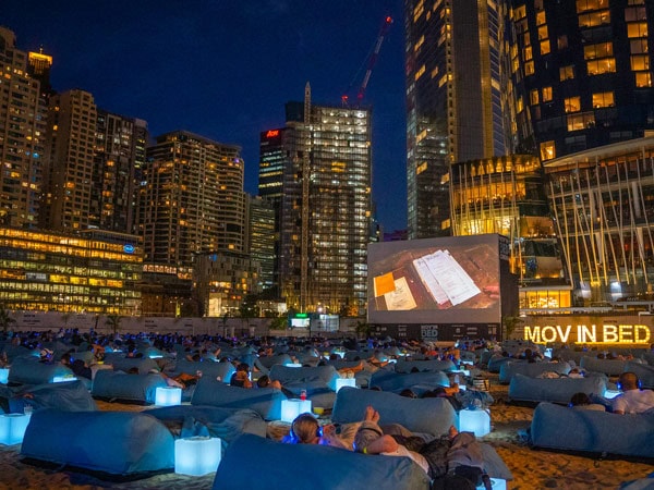 people lying down in plush beds at Mov'In Bed, Melbourne and Sydney