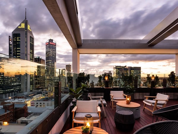 the rooftop bar at QT Perth during sunset