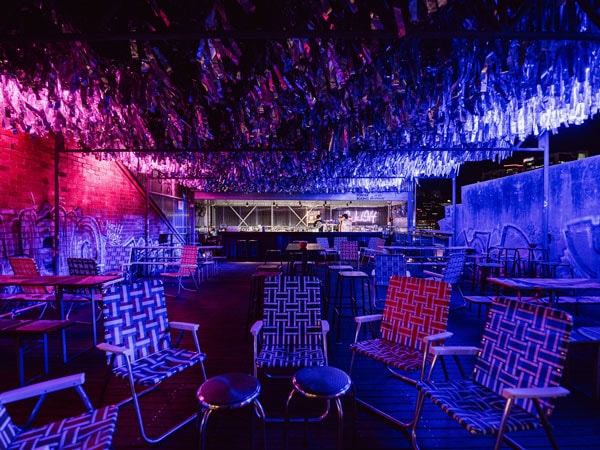 the bar interior with blue lighting at Hello at The Rechabite, Perth