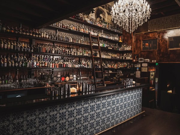 the dimly lit bar at Savile Row, Brisbane