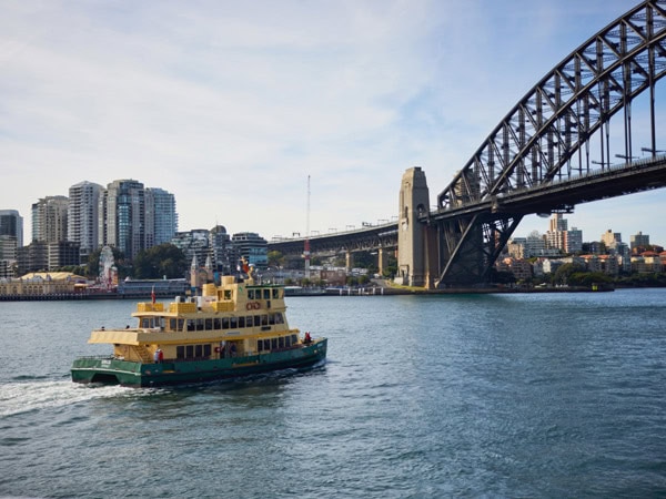 a ferry cruising Sydney Harbour