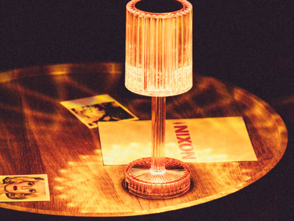 a lamp with golden lighting on the table at The Nixon Room, Brisbane
