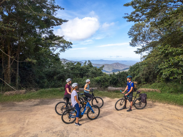 cyclists gather at Paluma Range National Park with NQ Cycle Journeys