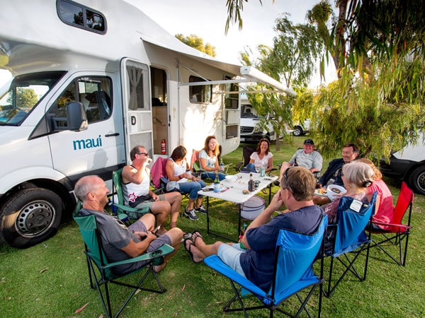 a group of travellers gathering outside a caravan at Big4 Port Fairy Holiday Park