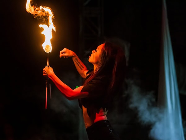 A woman throwing fire at Adelaide Fringe Festival