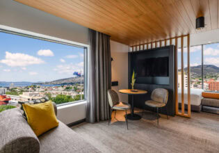 a huge window overlooking the city at Mövenpick Hotel Hobart