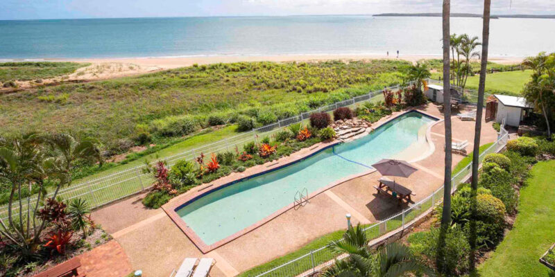 an aerial view of the pool and beach at BreakFree Great Sandy Straits Hervey Bay