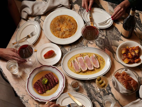 a spread of food on the table at Hotel Morris Sydney