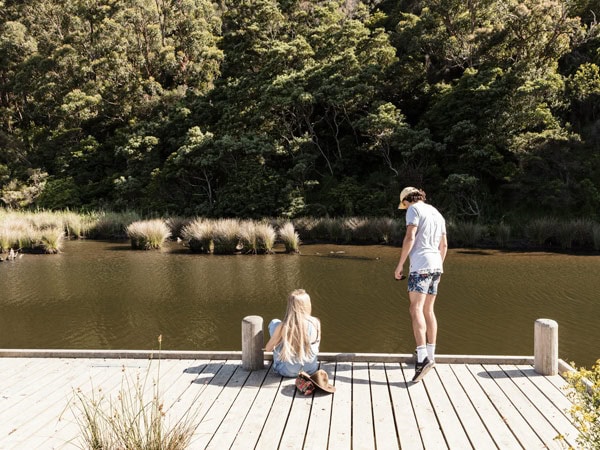 a couple relaxing by the Kennett River