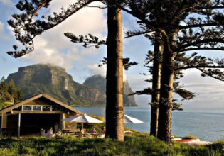 the Pinetrees Lodge nestled among tall pine trees, Lord Howe Island accommodation