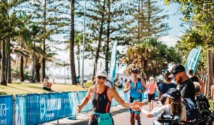 Woman running in the Mooloolaba Triathlon on the Sunshine Coast