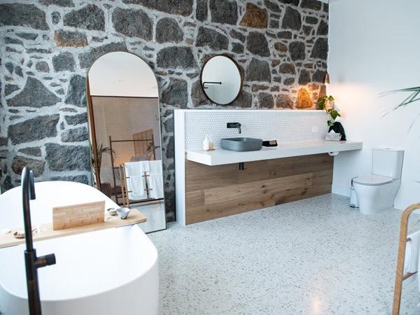 a Euro-style walk-in shower with tub at The Oak & Anchor Hotel, Port Fairy