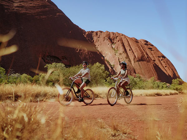 bike riders at uluru