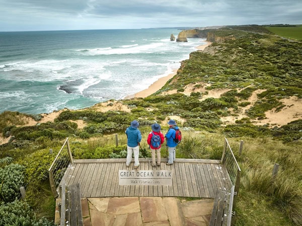 hikers admiring the view from the Great Ocean Walk viewpoint