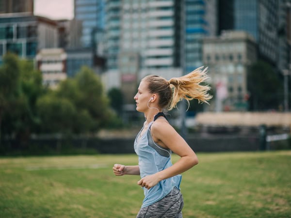 Woman running in the city