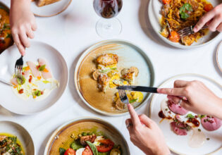 a spread of food on the table at Cichetti Club, Broome