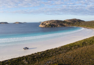 Aerial View of a 4WD driving on Lucky Bay, Esperance
