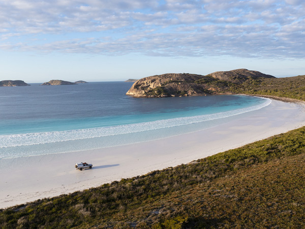 Aerial View of a 4WD driving on Lucky Bay, Esperance