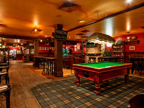 a pool table inside Seanchai Irish Pub