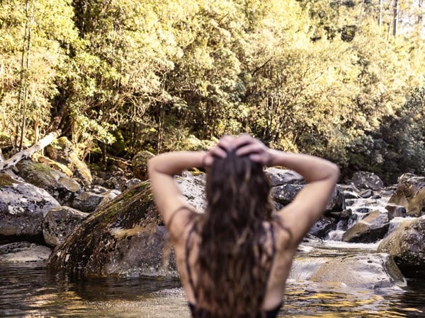 Woman swimming at Wellington Park in Southern Tasmania