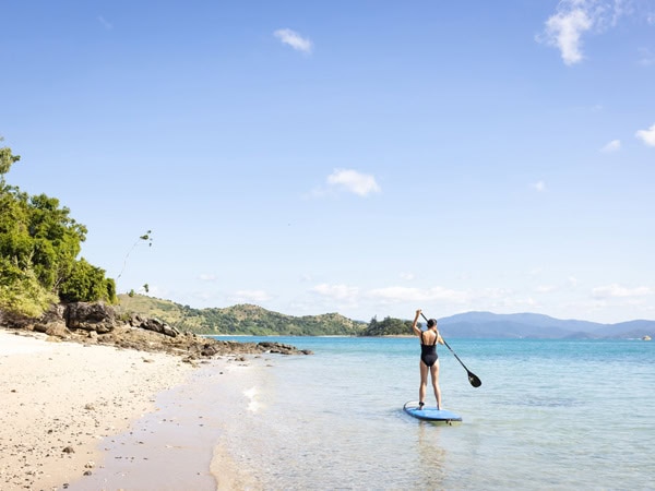Woman supping in the Whitsundays