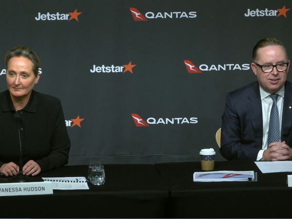 Qantas CEO Vanessa Hudson sitting beside Alan Joyce
