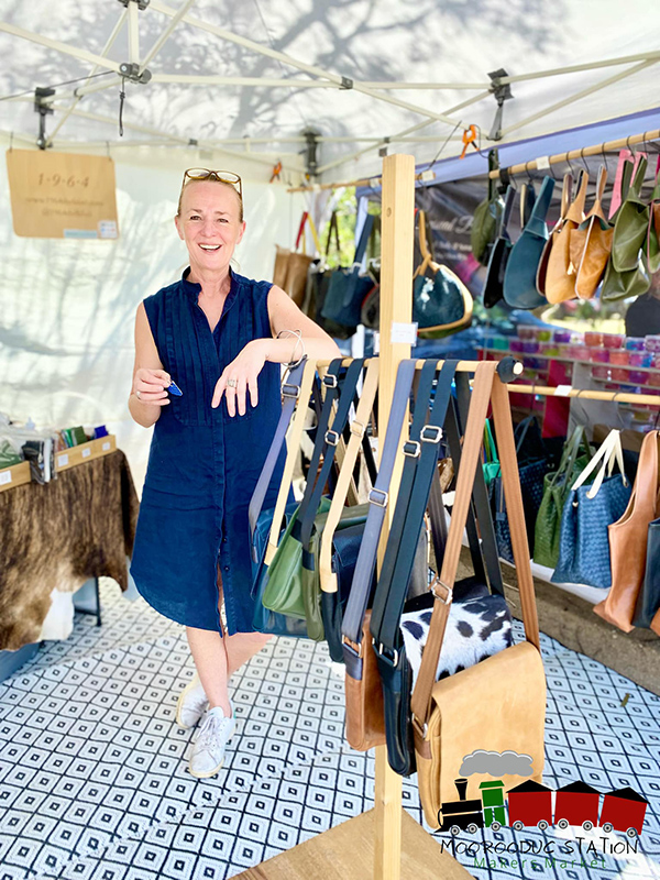 A lady with her stall of bags at Moorooduc Station Market.