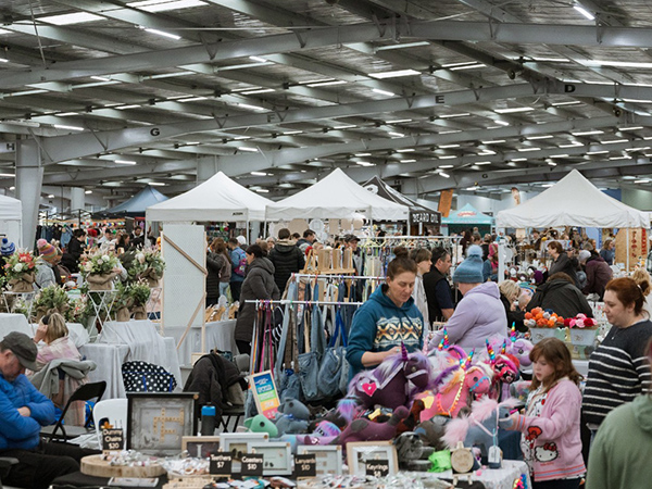 People checking out stalls in the Mornington Racecourse Craft Market.