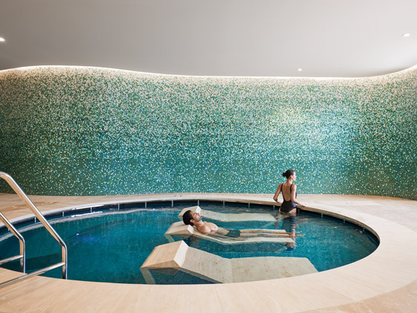 a couple soaking in the relaxation pool at RACV Cape Schanck Resort, Mornington Peninsula