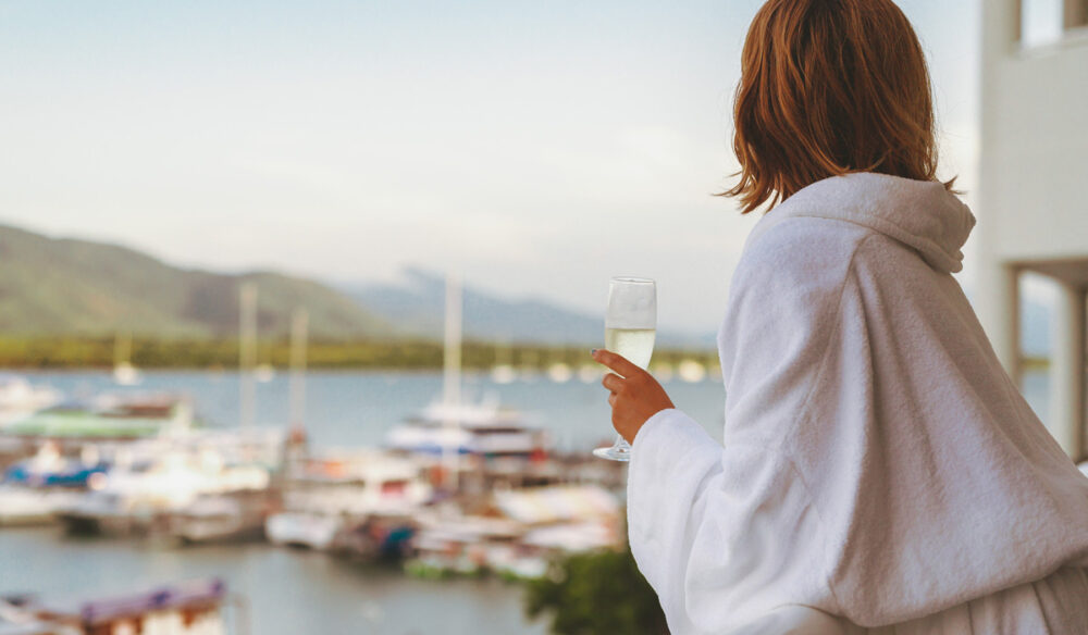 Woman celebrating with a stay at Shangri-La The Marina Cairns