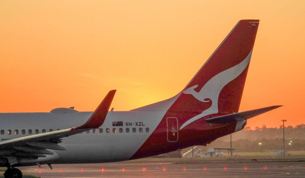 the Qantas plane at sunset