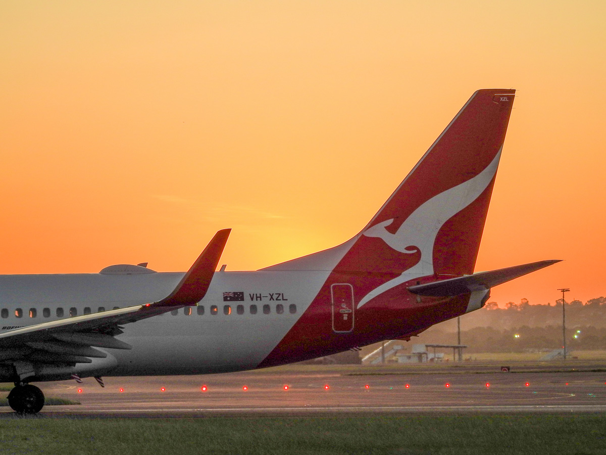 the Qantas plane at sunset