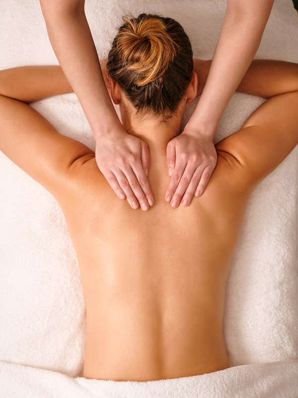 hands on the back of a woman, endota Day Spa, Mornington Peninsula