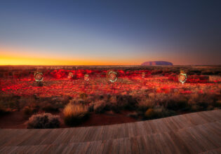 the Uluru landscape at sunrise