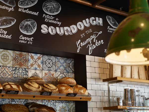 bread on display inside The Grumpy Baker, Potts Point