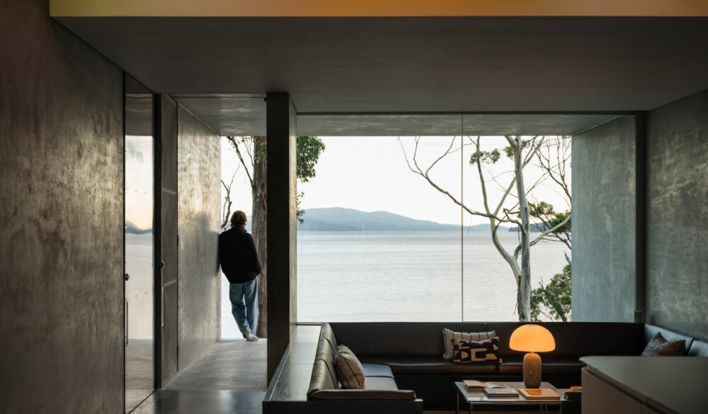 Guest at Vipp Tunnel on Bruny Island looks out at the view