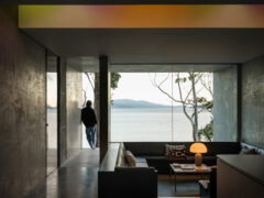 Guest at Vipp Tunnel on Bruny Island looks out at the view