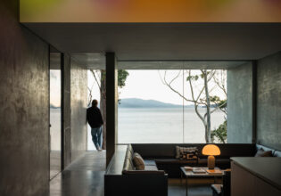 Guest at Vipp Tunnel on Bruny Island looks out at the view