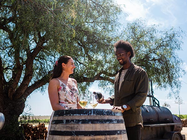 two people trying the wine at Austin's wines