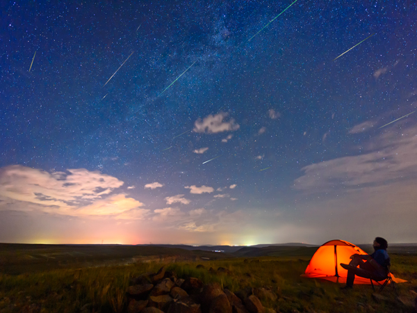Man watching meteor shower