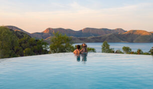a couple in the pool at Lake Argyle