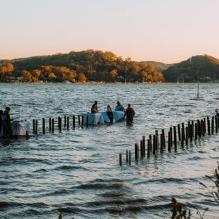 guests in the water for an experience at Sydney Oyster Farm - Central Coast food