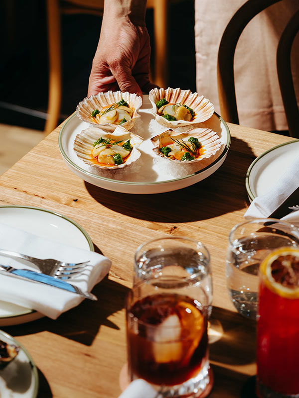 table spread at two noble restaurant