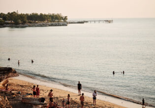 people swimming in Nightcliff Beach, Darwin