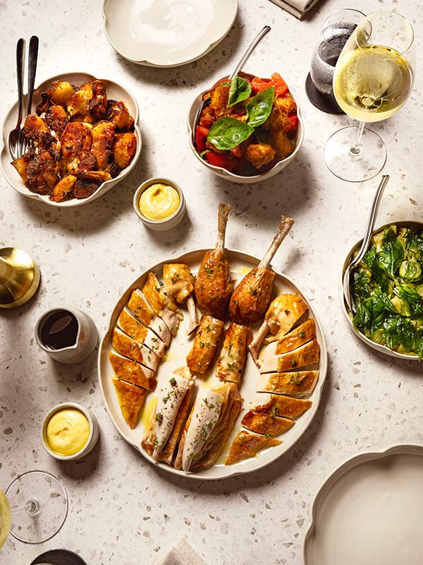 table spread including a lobster dish from Catseye Pool Club, The Sundays