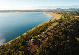 Aerial view of eight new Wilderluxe glamping tents at Lake Keepit